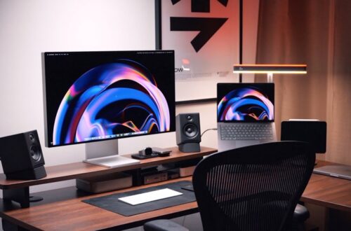 small gaming desk setup vs large corner gaming setup